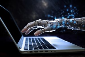 ordenador y una mano d en robot